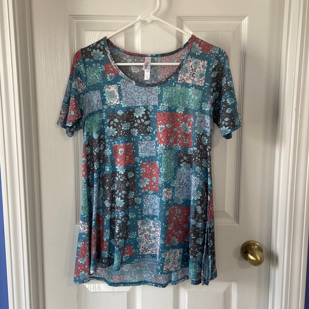 LuLaRoe shirt, Size XXS, but more like a Small